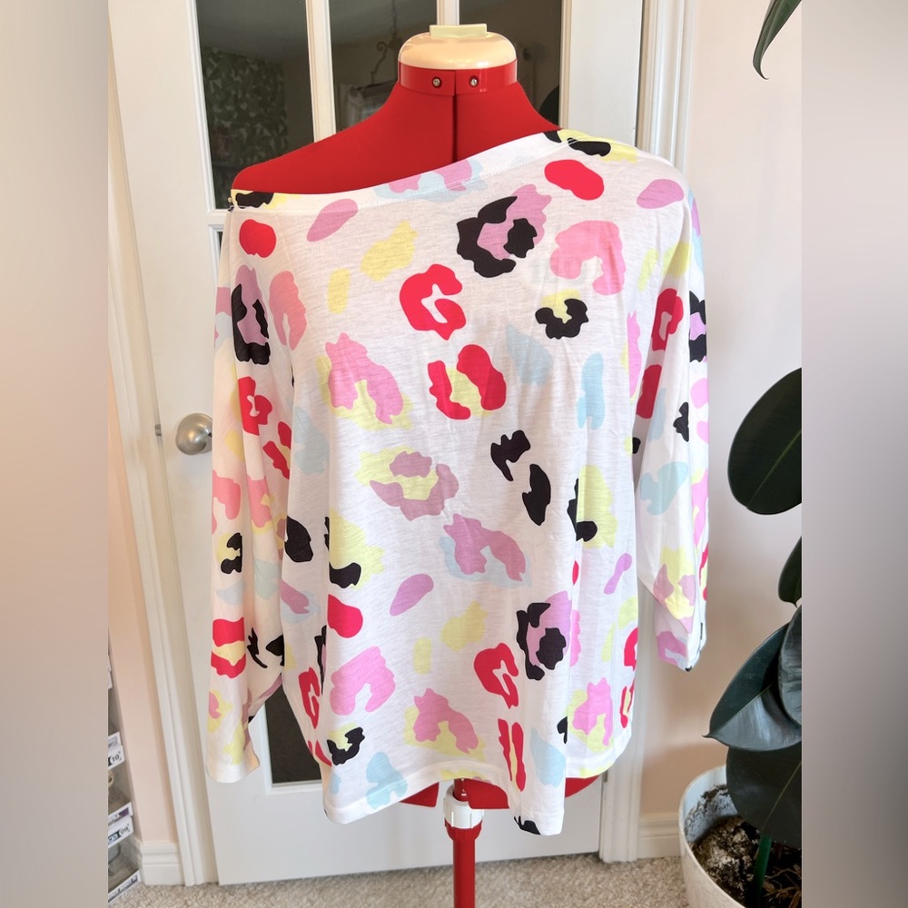 NEW, never worn off the shoulder animal print summer top. Size large.